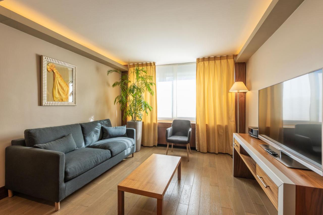 Sofitel Lyon Bellecour Hotel Bagian luar foto A living room