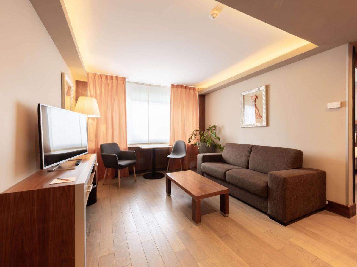 Sofitel Lyon Bellecour Hotel Bagian luar foto A living room