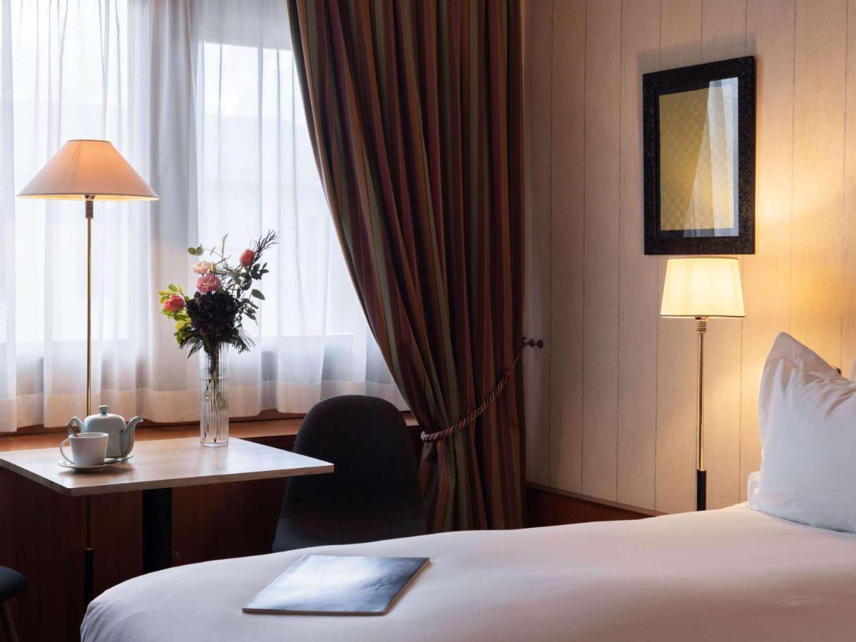 Sofitel Lyon Bellecour Hotel Bagian luar foto A room at the hotel