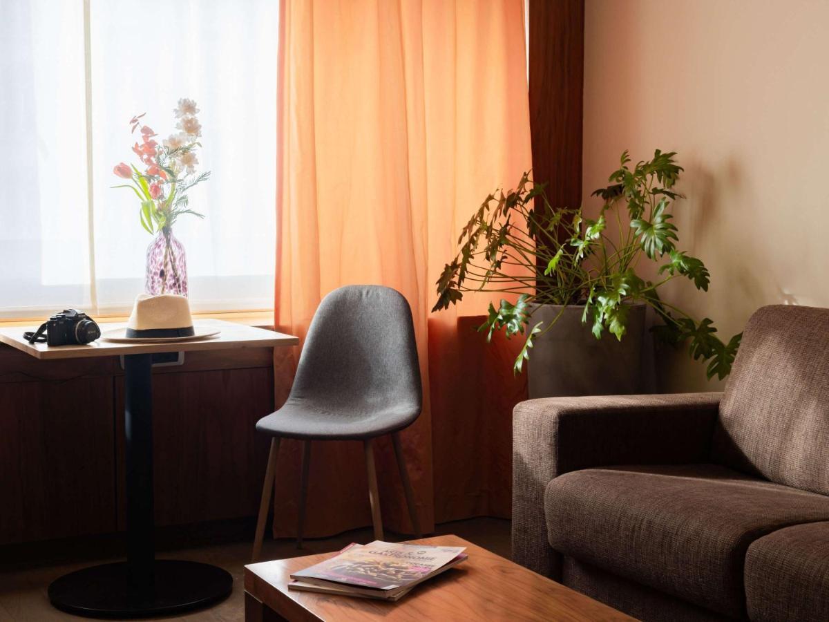 Sofitel Lyon Bellecour Hotel Bagian luar foto A room at the hotel