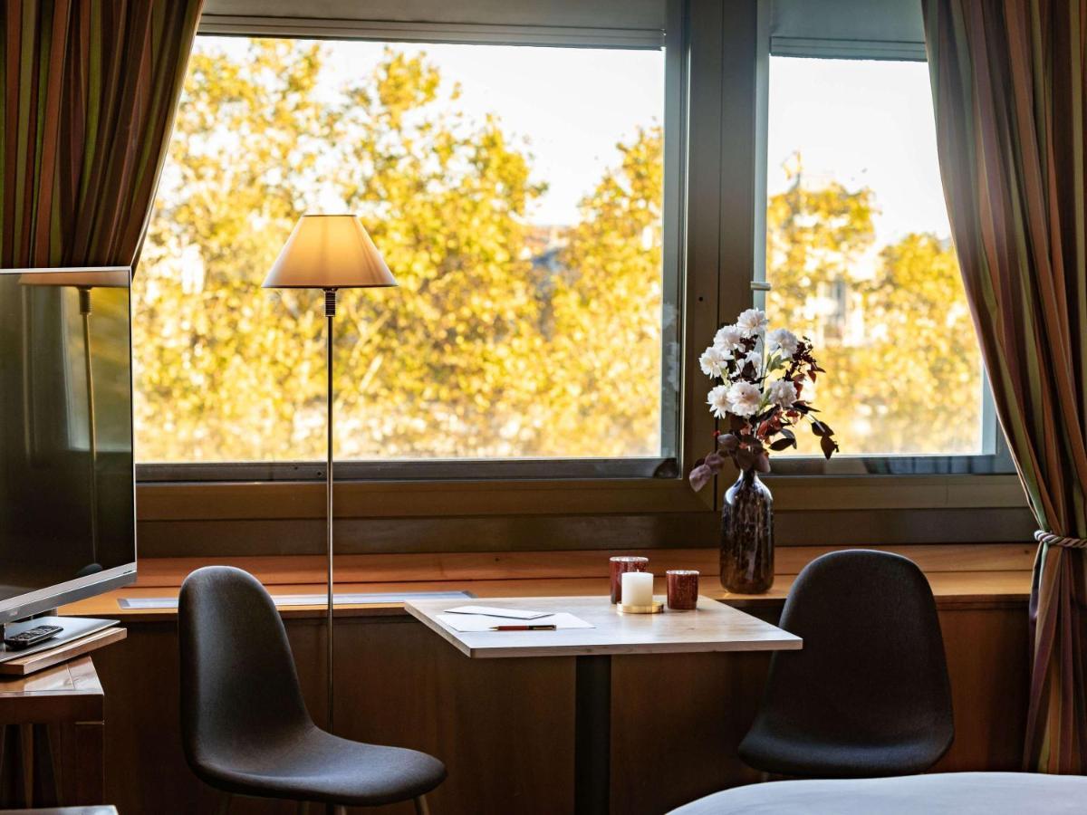 Sofitel Lyon Bellecour Hotel Bagian luar foto A room at the hotel