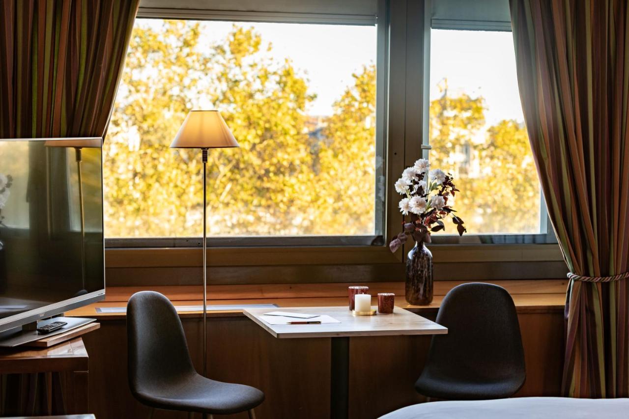 Sofitel Lyon Bellecour Hotel Bagian luar foto A room at the hotel