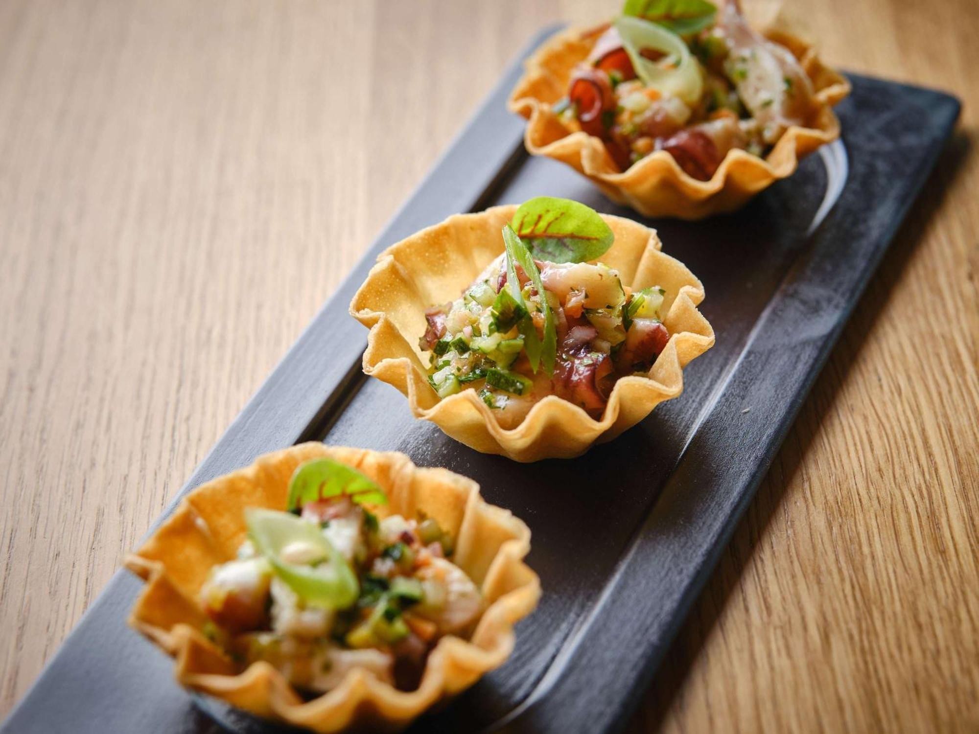 Sofitel Lyon Bellecour Hotel Bagian luar foto A prawn and avocado salad served in a pastry bowl
